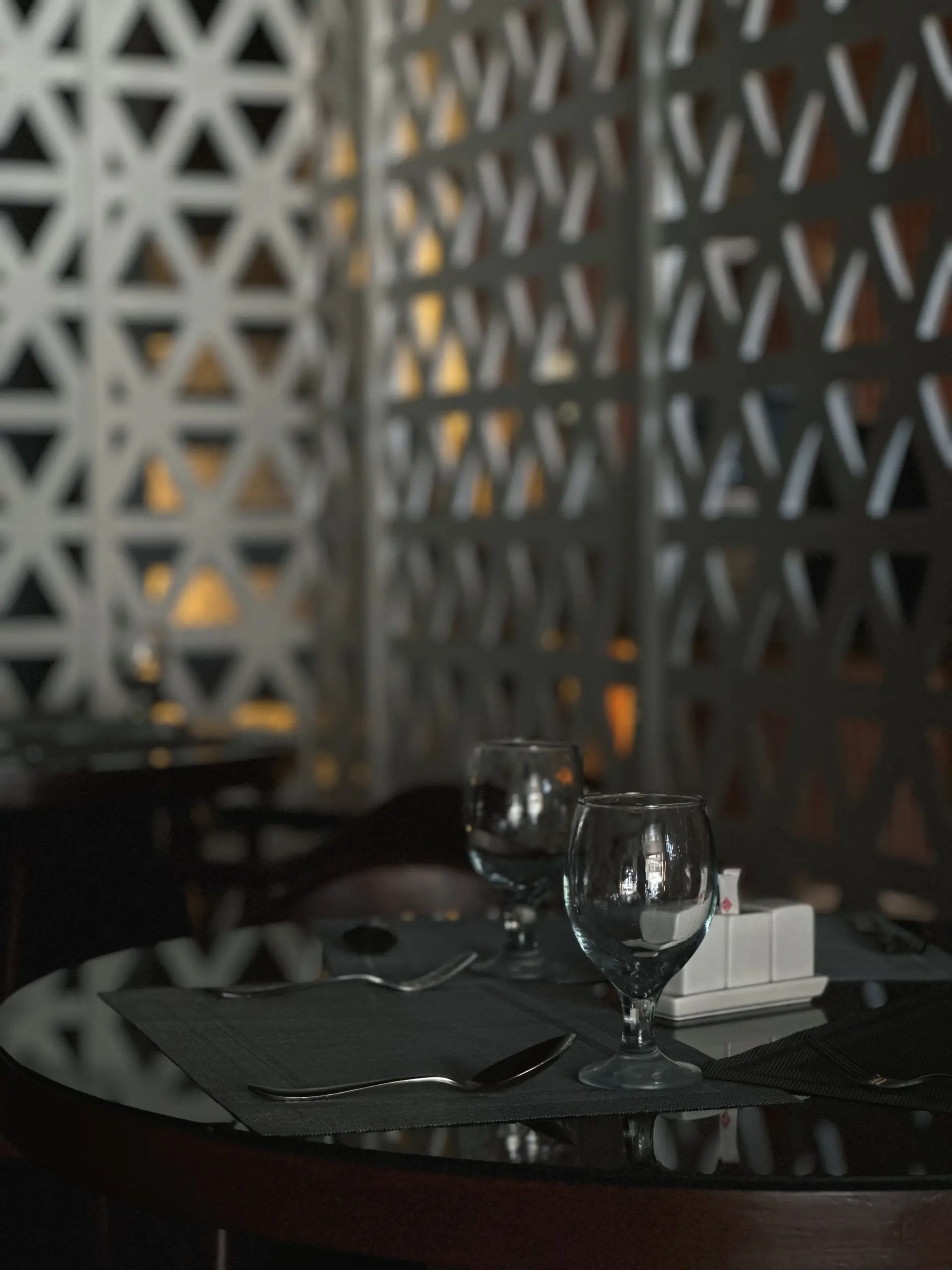 Upscale restaurant table setup with crystal glassware