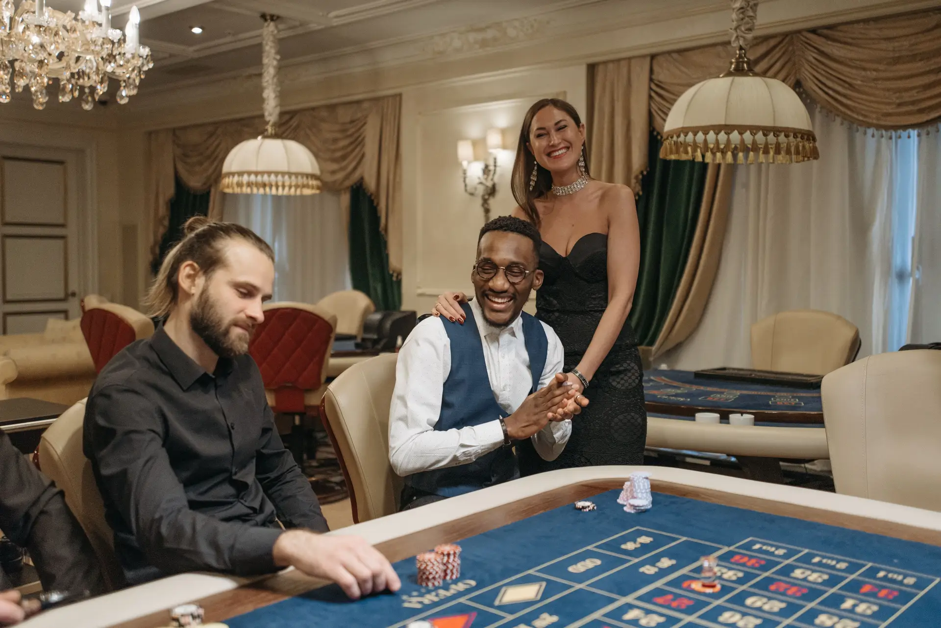 Elegant social group at a casino table